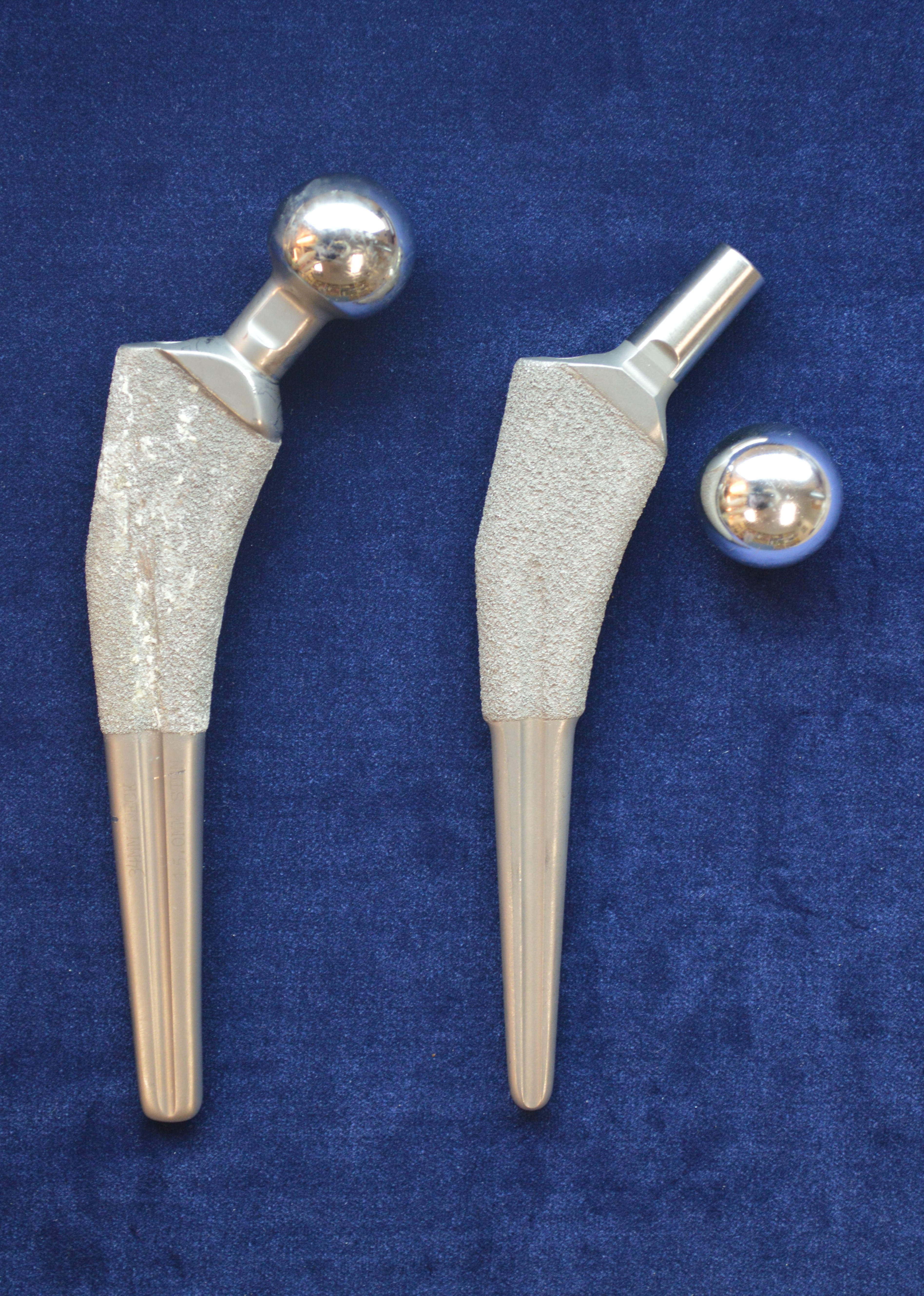 Fig. 1 
          Photograph of the first (left) and second (right) generation Taperloc femoral components. A non-modular implant was used in this series (left). An implant with a modular femoral head is in current use (right).
        